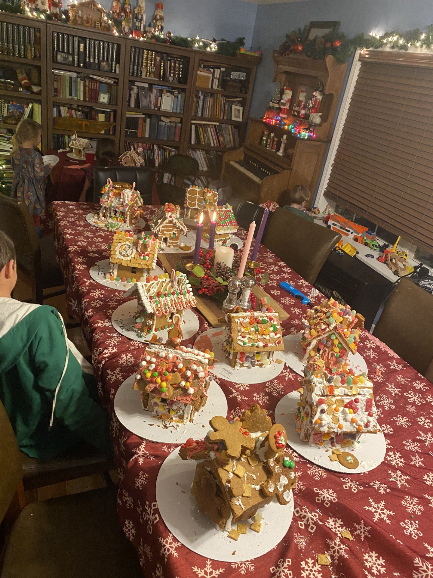 Families and parishioners gathered for a gingerbread house party.